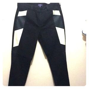 Black NYDJ skinny jeans with  faux leather details